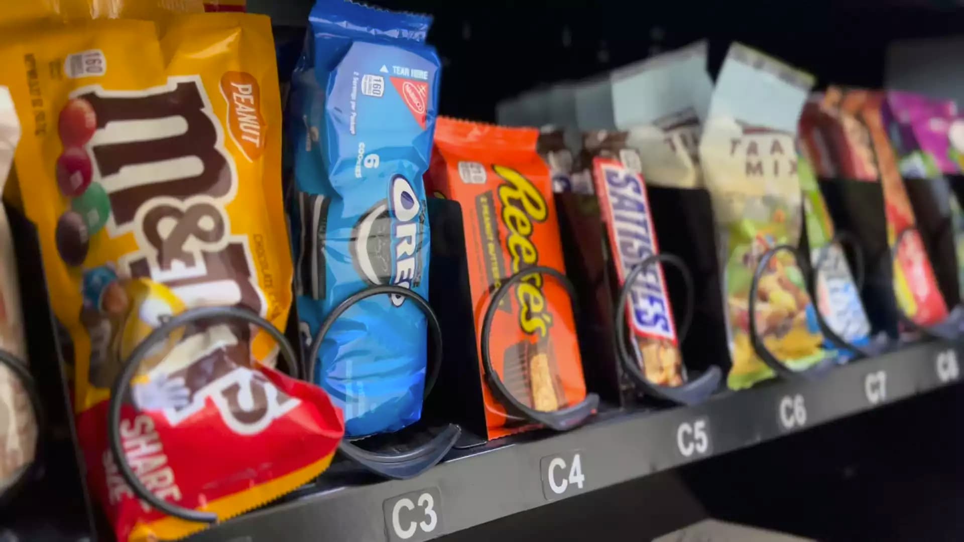 Traditional snacks and drinks stocked in a vending machine